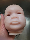 Silicone baby head for cuddle baby open eyes Donna kohn