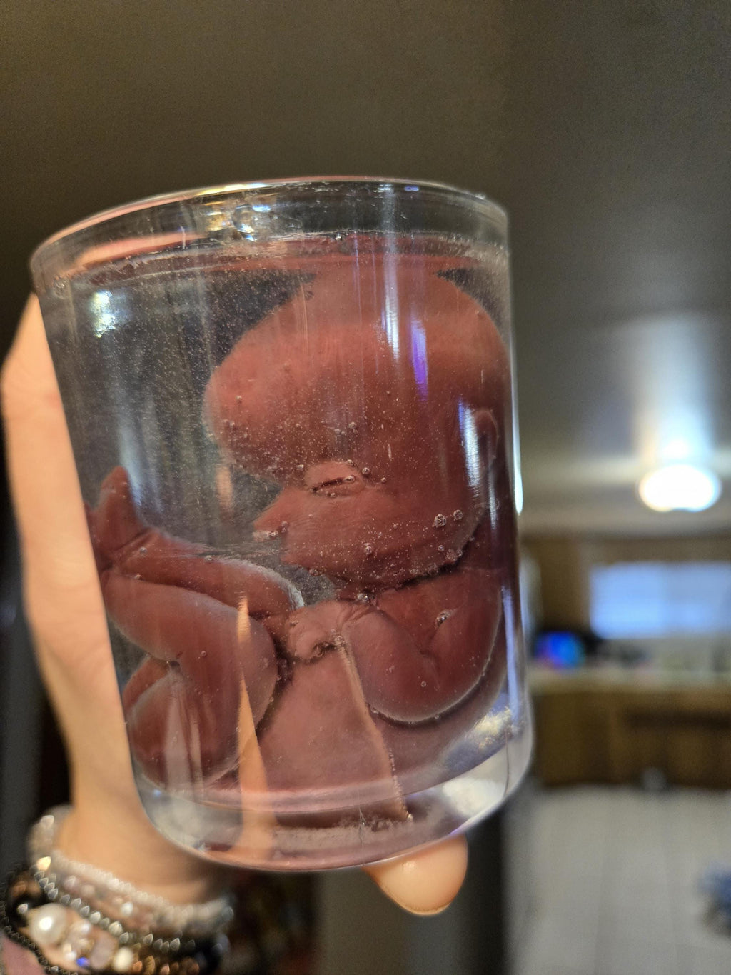 Memorial silicone fetus is glass jar with resin beautiful gift or for display